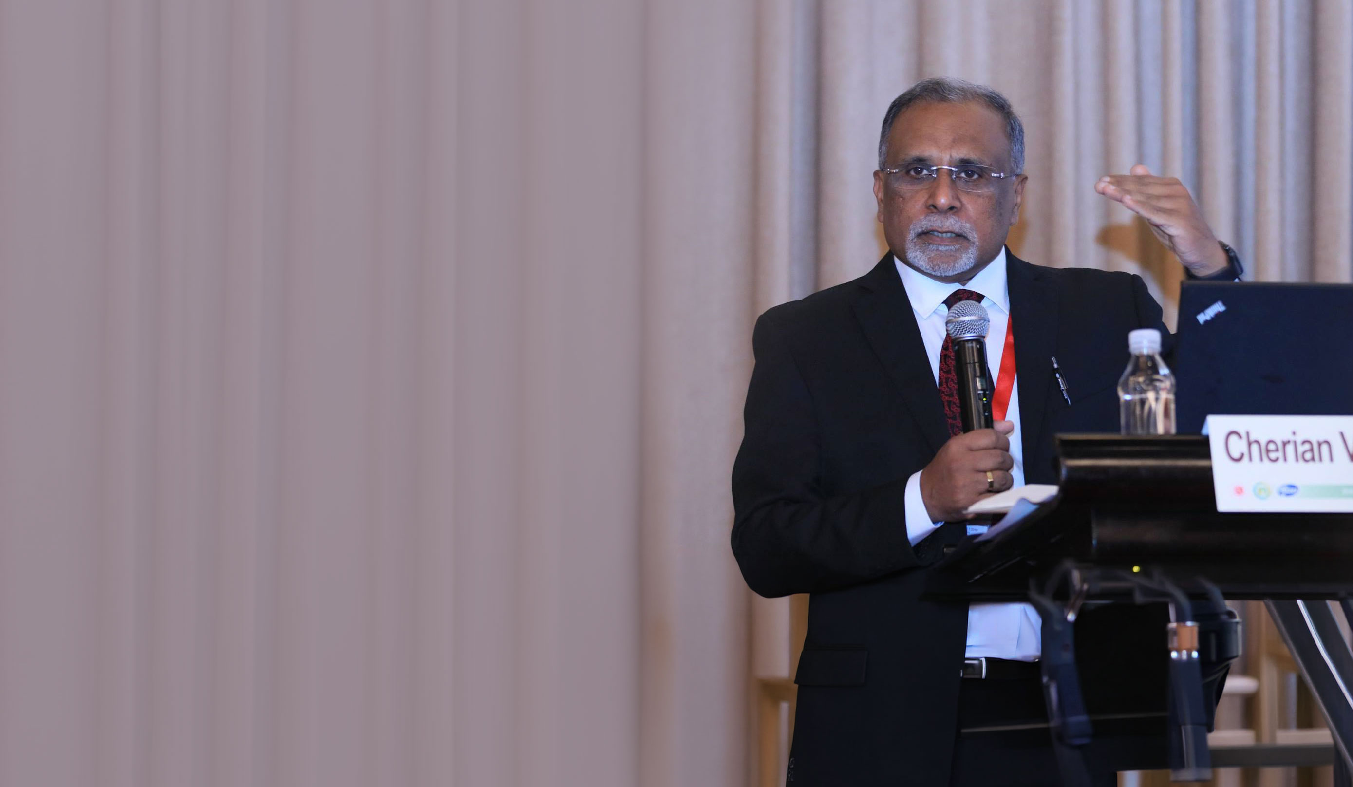 Cherian Varghese presenting at an international health conference